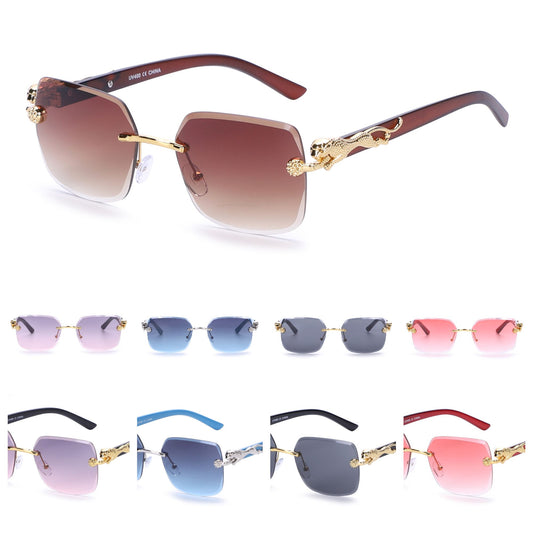 Designer-Style Rimless Glasses with Gold Leopard Side Emblem and Smooth Tapered Temples J10975