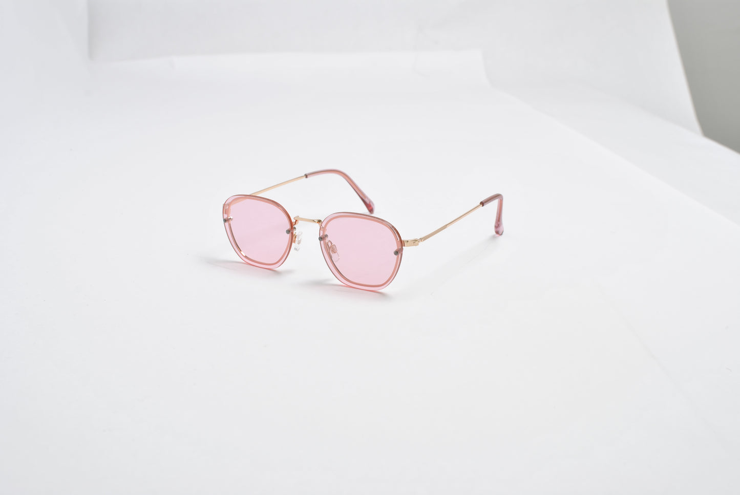 Hex-Oval Rimless Tinted Sunglasses with Gold MetalTemples SK10470