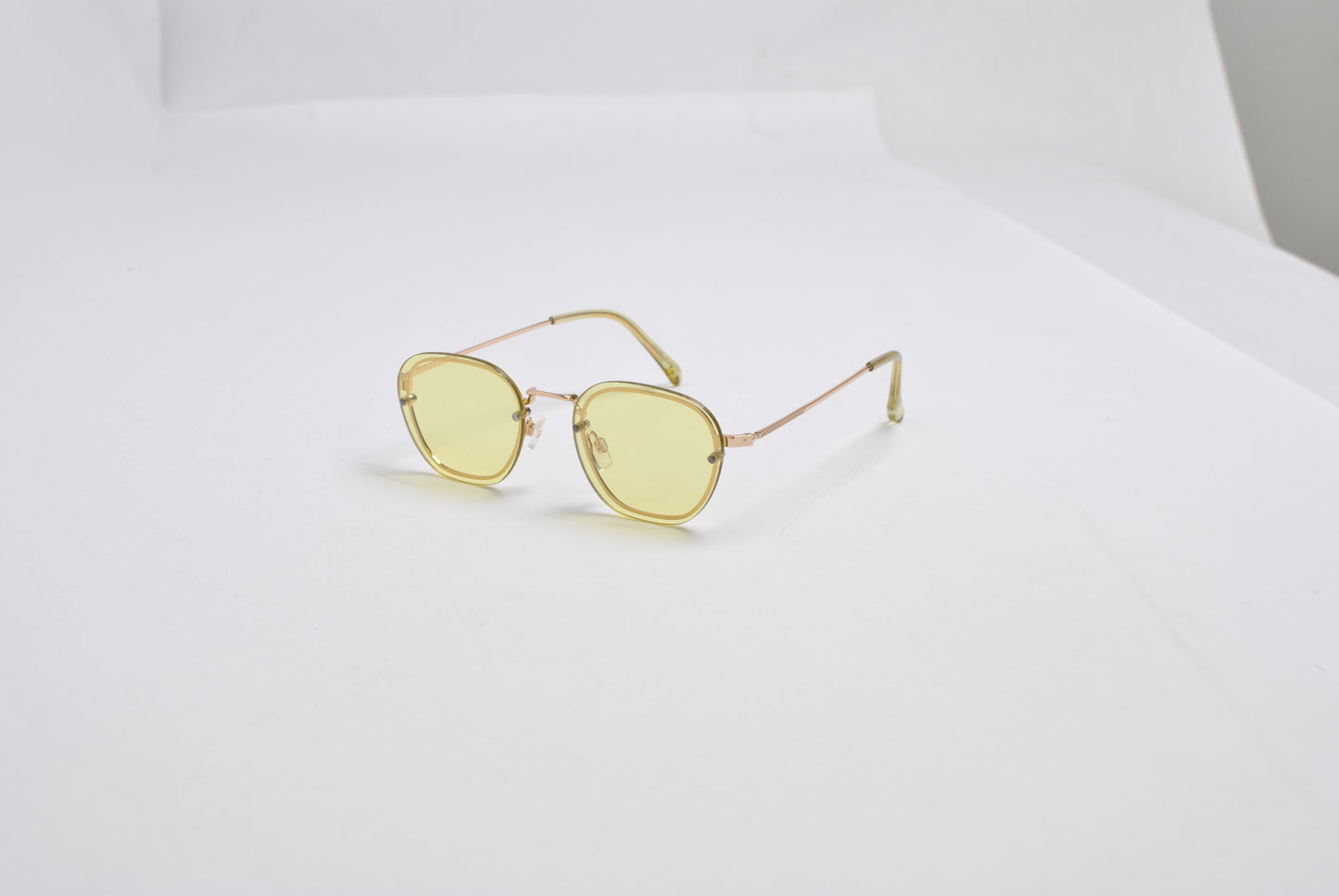 Hex-Oval Rimless Tinted Sunglasses with Gold MetalTemples SK10470