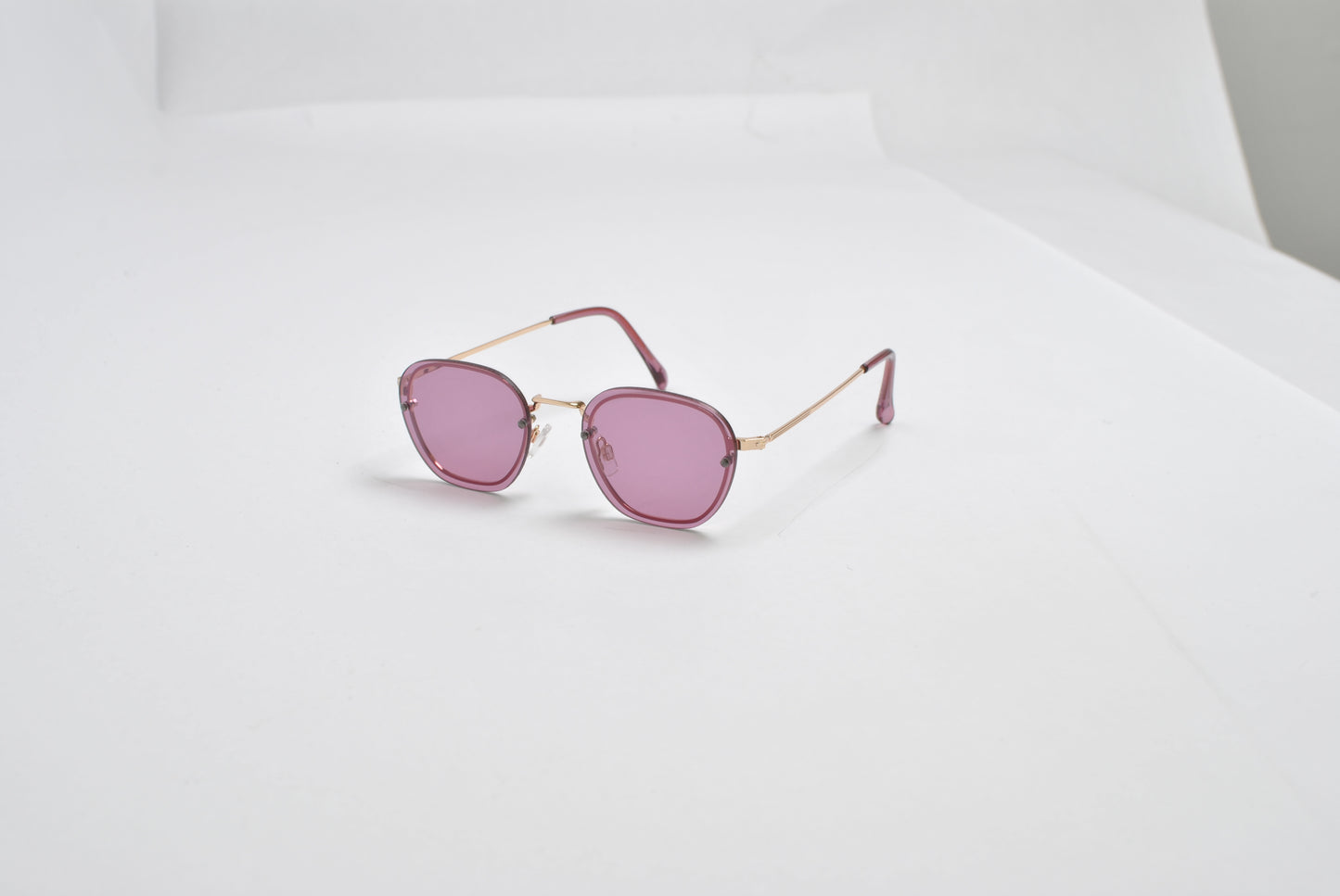 Hex-Oval Rimless Tinted Sunglasses with Gold MetalTemples SK10470