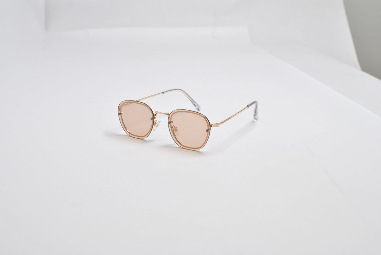 Hex-Oval Rimless Tinted Sunglasses with Gold MetalTemples SK10470